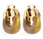 The Lizzie Fortunato Organic Gold Hoops are resin earrings with gold-tone tops and marbled brown hoops, shown on a white background.