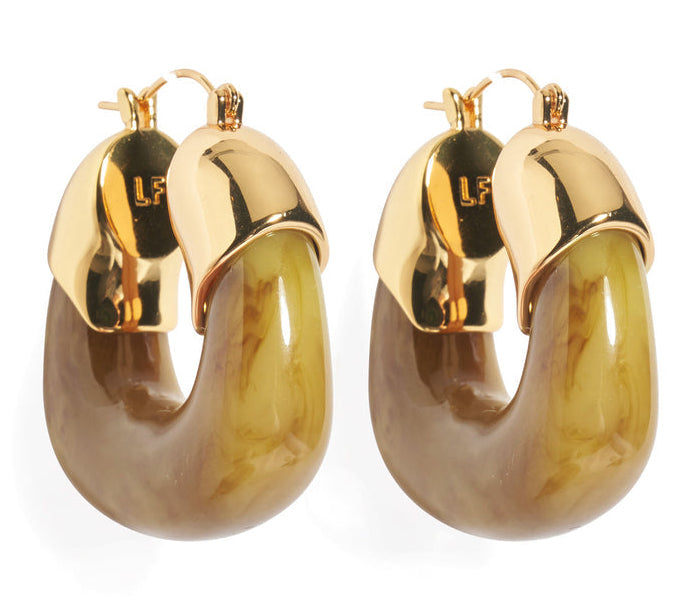 The Lizzie Fortunato Organic Gold Hoops are resin earrings with gold-tone tops and marbled brown hoops, shown on a white background.