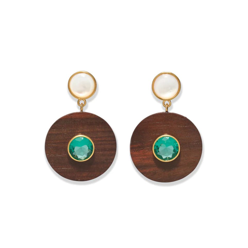 The Taj Disc Earrings by Lizzie Fortunato feature gold-plated brass, a white stud, a brown wooden circle, and a vivid green topaz centerpiece.