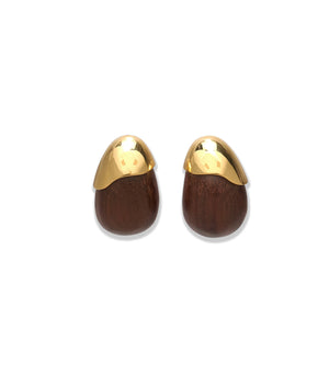 The Toro Earrings by Lizzie Fortunato feature oval-shaped acacia wood with dark brown bases and gold-plated brass caps, shown on a white background.