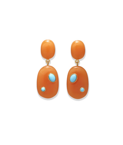 The Satsuma Earrings by Lizzie Fortunato are orange resin drop earrings with gold fittings, each adorned with two small turquoise-colored stones set irregularly.