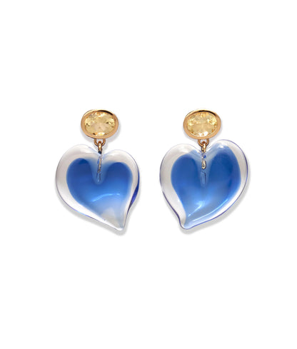 The Dali Heart Earrings by Lizzie Fortunato are gold-plated brass earrings with circular studs and dangling blue handmade glass heart charms.