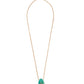The Constance Necklace by Lizzie Fortunato features a gold-plated brass chain and a turquoise, egg-shaped amazonite pendant with a central decorative accent.