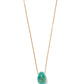 The Constance Necklace by Lizzie Fortunato showcases a gold chain and a teal egg-shaped amazonite pendant with a central green topaz, elegantly displayed on a white background.