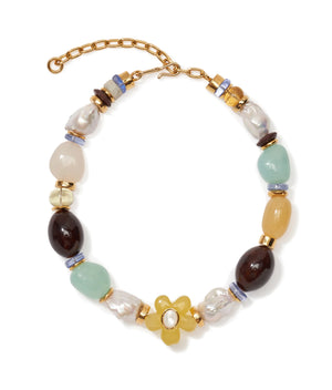 The Mistflower Necklace by Lizzie Fortunato features multicolored beads, freshwater pearls, gold accents, a yellow flower-shaped bead, and an adjustable gold chain clasp.