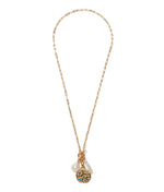 The Campo Charm Necklace by Lizzie Fortunato features a gold-plated paperclip chain, a textured round pendant, turquoise detail, and two freshwater pearl-like charms, shown on a white background.