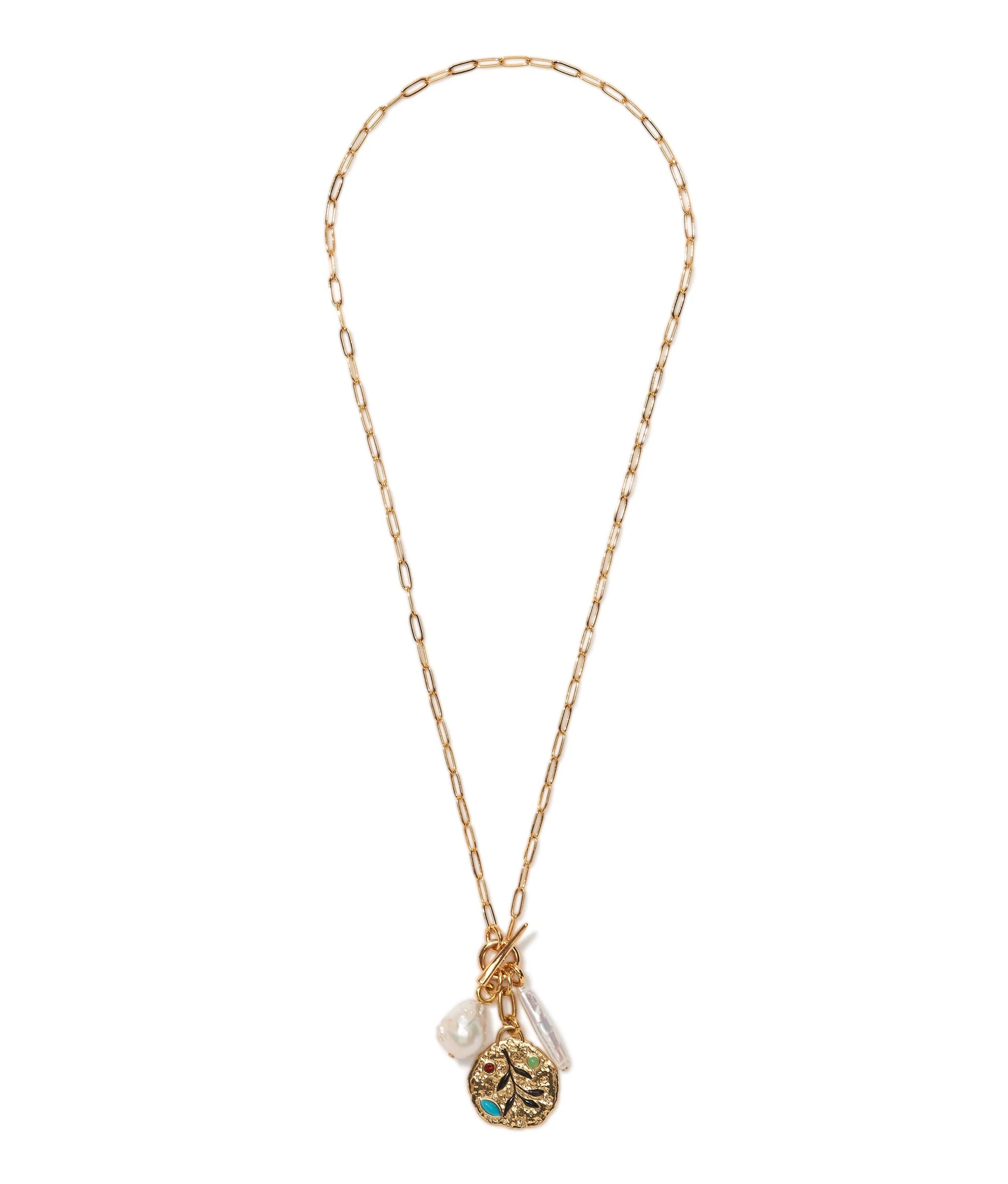 The Campo Charm Necklace by Lizzie Fortunato features a gold-plated paperclip chain, a textured round pendant, turquoise detail, and two freshwater pearl-like charms, shown on a white background.