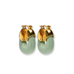 A pair of Lizzie Fortunato Organic Mini Gold Hoops, crafted from gold-plated brass with pale green accents, featuring a glossy finish, latch back closures, and a small engraved detail on the gold portion.