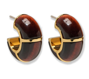 The Zellige Hoops by Lizzie Fortunato are crescent-shaped earrings inspired by Moroccan jewelry, crafted with dark brown enamel and gold-tone metal accents, displayed against a white background.
