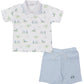 The Kissy Kissy Fairway Foursome Baby Bermuda Set by Kissy Kissy includes a white polo shirt with green and blue golf print patterns and light blue bermuda shorts with a drawstring waist.