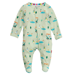 The Magnetic Me Baby Modal Footie features a light green golf print, long sleeves, covered feet, and magnetic closures for easy changes. Made from eco-friendly TENCEL™ modal that’s soft and temperature-regulating for all-night comfort.