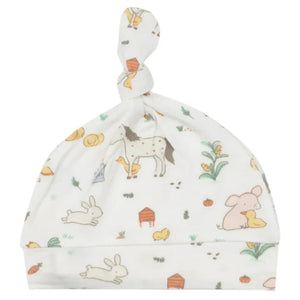 The Angel Dear Farm Babies Knotted Hat showcases charming animal illustrations, such as a bunny, horse, duck, and mouse surrounded by plants and small pumpkins on a white background. Crafted with soft viscose from bamboo, its adjustable knot offers the perfect fit for your little one.