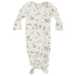 The Angel Dear Farm Babies Knotted Gown showcases delightful prints featuring farm animals and nature motifs, including cows, rabbits, and pumpkins. These knotted gowns are designed for easy diaper changes, making them a practical yet adorable addition to your baby's wardrobe.