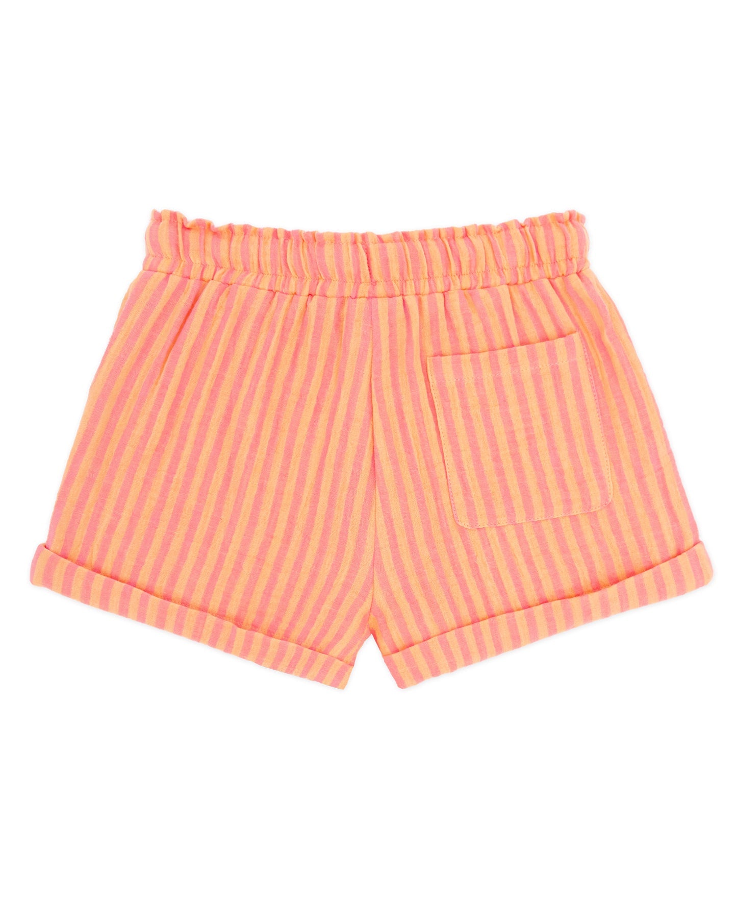 The Feather 4 Arrow Girls’ Salty Short features pink and orange striped gauze fabric with an elastic waistband, rolled cuffs, and a single back pocket, shown on a white background for a relaxed, casual style.