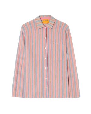 The Fine Stripe Showtime Shirt by Guest in Residence features a relaxed fit, long sleeves, vertical pink, blue, and white stripes, a front chest pocket, and a pointed collar.