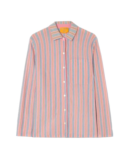 The Fine Stripe Showtime Shirt by Guest in Residence features a relaxed fit, long sleeves, vertical pink, blue, and white stripes, a front chest pocket, and a pointed collar.