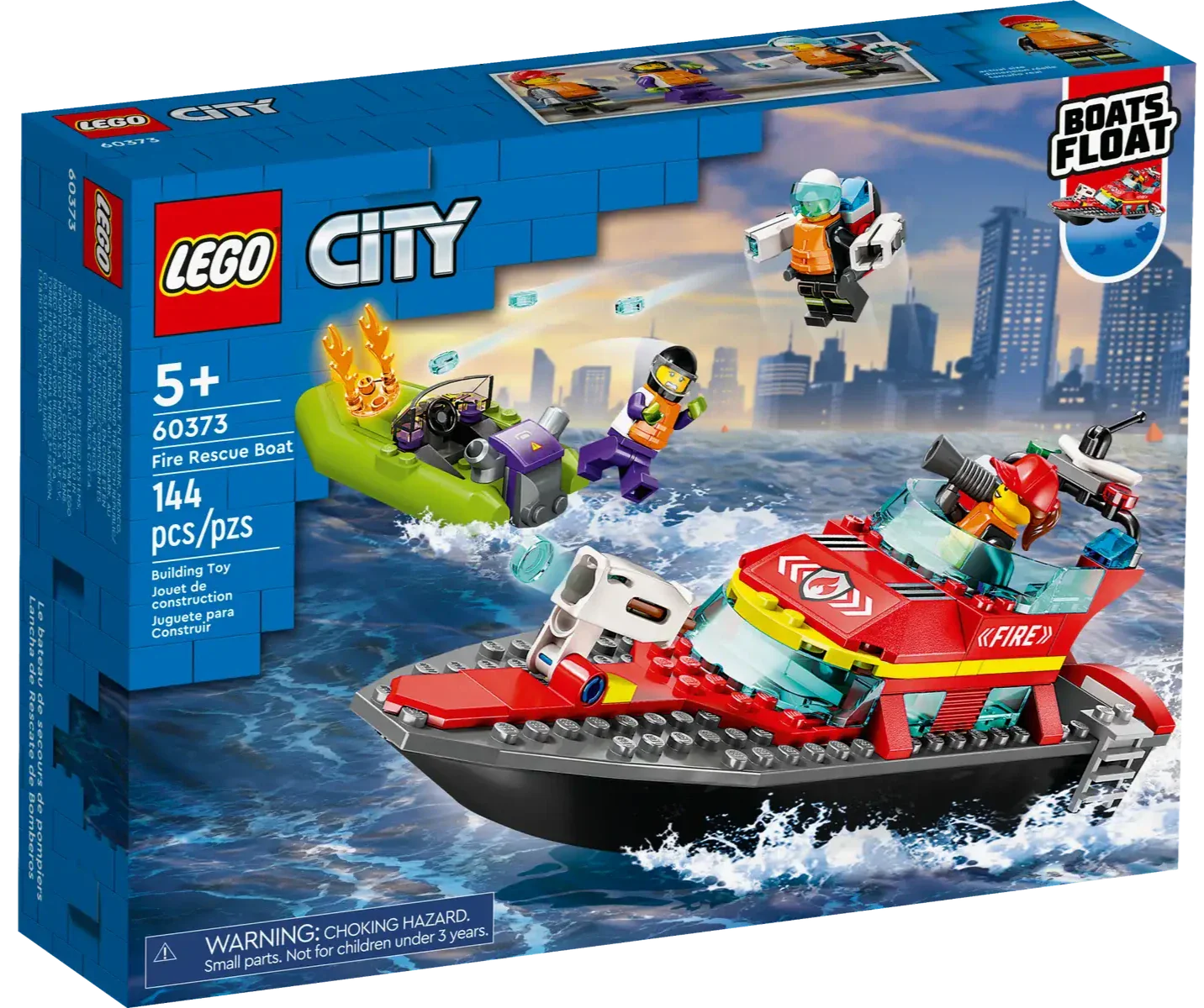 The LEGO® City Fire Rescue Boat is a 144-piece set for ages 5+, featuring a detailed fireboat, green boat, and three minifigures—shown on the box with a lively city and water backdrop.