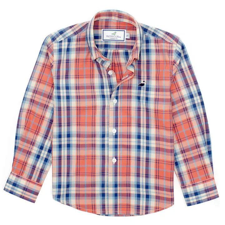 Introducing the Properly Tied Seasonal Sportshirt, a long-sleeved, button-up crafted from a soft cotton blend. It features a striking red, blue, and white plaid pattern with a small embroidered logo on the chest.