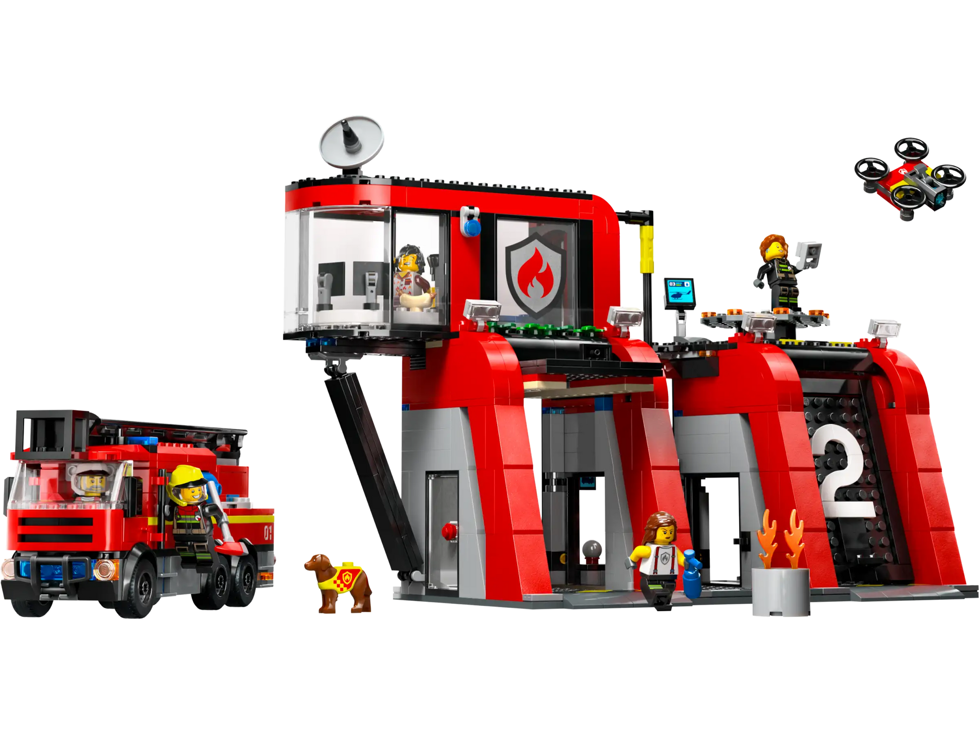 The LEGO® Fire Station with Fire Truck set includes minifigures, a dog, drone, and accessories outside a red and gray building marked with a "2" and flame—ideal for firefighting adventures from LEGO®.