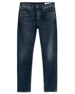 The Rag & Bone Fit 2 Authentic Stretch Denim jeans feature a dark indigo wash, button and zip fly, front and back pockets, thigh fading, and a slim fit silhouette.