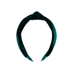 Girls’ Holly Headband in dark green with a knotted design.