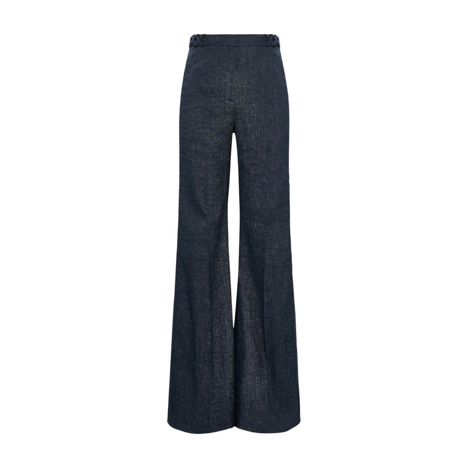 The Fluid Denim Pants by Dorothee Schumacher feature a high-waisted, wide-leg silhouette in dark denim with braided waistband detailing, evoking vintage suiting style, shown against a white background.