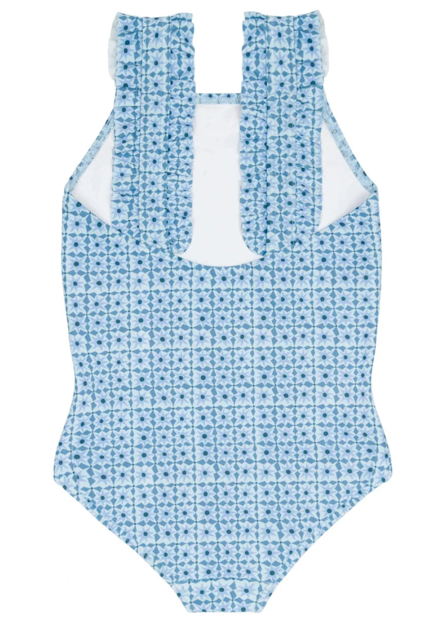 The Minnow Girls' Starburst Ruffle Strap One Piece features a blue and white pattern, square neck, playful ruffle straps, and a stylish cut-out back—perfect for chic resort swimwear.