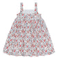 The Minnow Girls' Feathered Floral Square Neck Strap Dress features a sleeveless design, red and blue floral print, and a gathered full skirt.