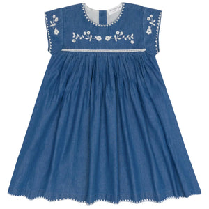 The Minnow Girl's Chambray Embroidered Cap Sleeve Dress features a gathered skirt, white floral embroidery on the chest and neckline, and decorative stitching—perfect for any occasion.