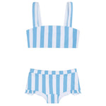 The Minnow Girls' Bandeau Bikini and Swim Shorts feature vertical blue and white stripes, a bandeau top with wide straps, and high-waisted swim shorts with side ruffle details.