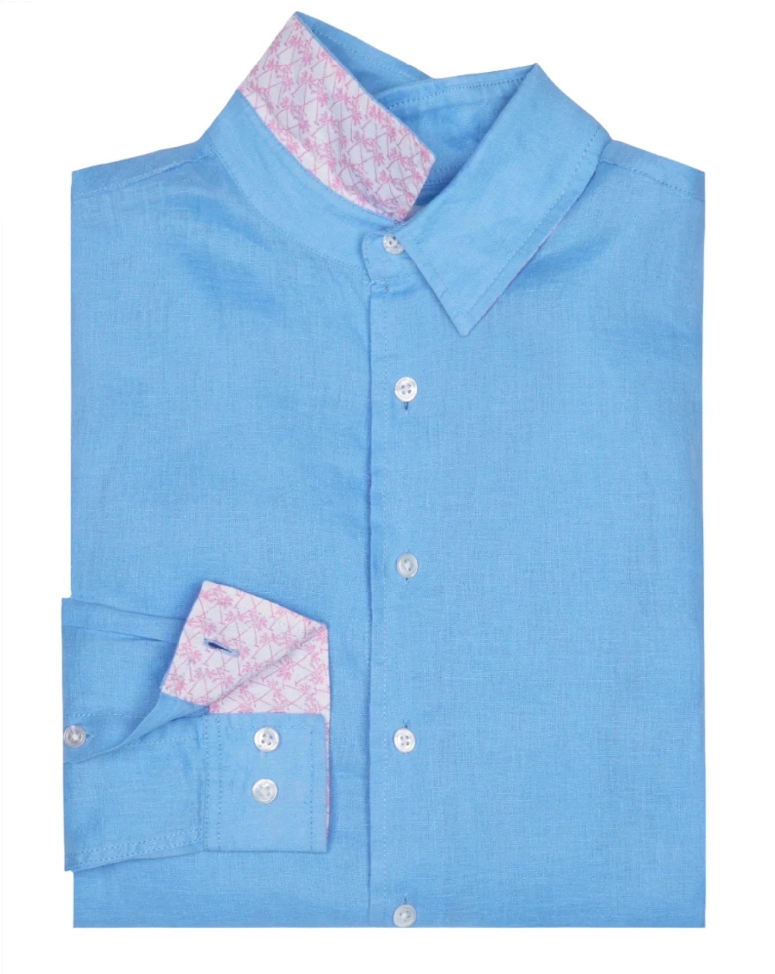 The Pink House Mustique Men's Plain Linen Shirt by Pink House Mustique is a folded light blue dress shirt featuring a pink patterned inner collar and cuffs. It boasts white buttons, a pointed collar, and a subtle contrast print for an elegant touch.