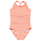 The Snapper Rock Girls' Cali Palms Recycled X Back Swimsuit is a sleeveless orange and white checkered one-piece for kids, featuring a knotted racerback and subtle palm tree patterns at the bottom.