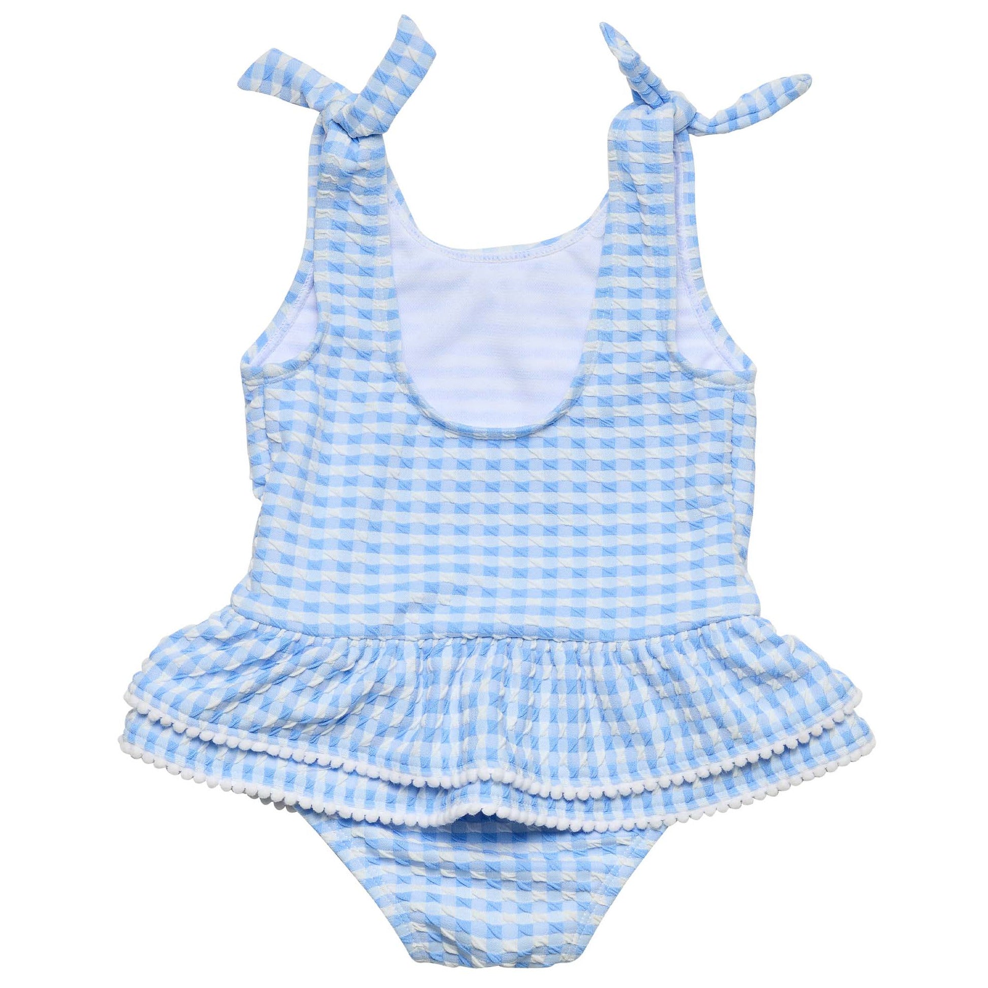 The Snapper Rock Baby Girls' Seaside Gingham Skirt Swimsuit features blue and white gingham, shoulder tie straps, a ruffled detail, and UPF50+ sun protection for stylish safety at the beach.