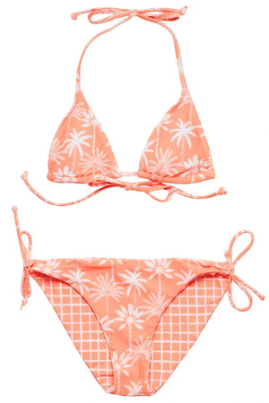 The Girls' Cali Palms Teen Recycled Triangle Bikini by Snapper Rock features a coral hue with white palm tree and grid prints, plus a string triangle top and tie-side bottoms—perfect for a stylish beach look.