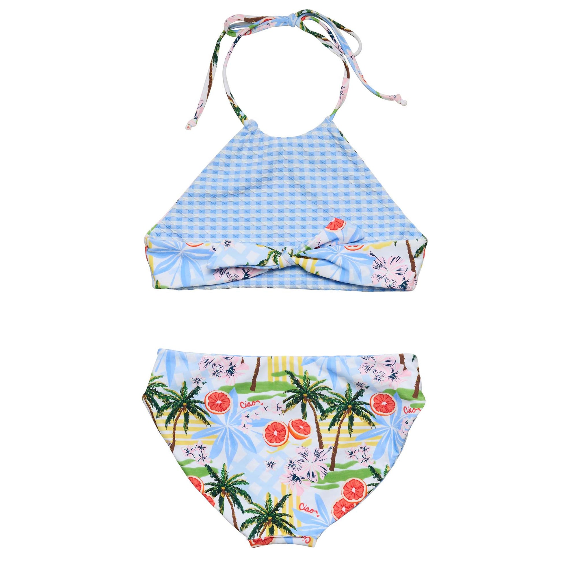 The Snapper Rock Girls' Ciao Paradiso Reversible Halter Bikini features a blue gingham halter top and Italian-inspired bottoms with palm trees, citrus, and flowers.