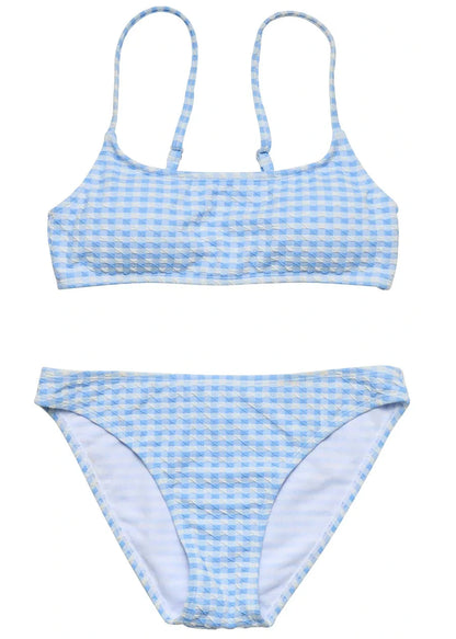 The Snapper Rock Girls' Seaside Gingham Teen Crop Bikini features a blue and white gingham pattern, a scoop neck crop top with adjustable straps, and matching bikini bottoms.