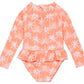 The Snapper Rock Baby Girls' Cali Palms Recycled Skirt Surf Suit is a peach, long-sleeve swimsuit with white palm trees, ruffle skirt, and back zipper—ideal for sunny adventures.