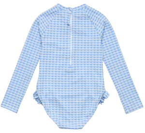 The Snapper Rock Girls' Seaside Gingham Leg Frill Surf Suit is a blue and white long-sleeve one-piece with UPF50+ protection, ruffle hip details, and a back zipper.