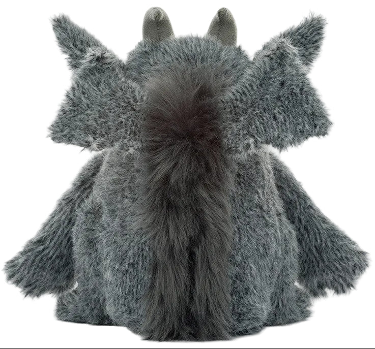 A gray, furry plush toy named the Growlston Gargoyle by Jellycat is pictured from the back, displaying its pointed ears, large wings, and bushy tail—this adorable creature perfectly captures whimsical charm.