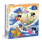 The Great Surf Puzzle by Chronicle Books is a 500-piece aquatic adventure puzzle featuring illustrated dogs and cats surfing on colorful boards in a large wave.