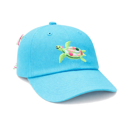 A blue Bits & Bows Turtle Bow Hat for kids, featuring an embroidered green, yellow, and pink sea turtle on the front panel.