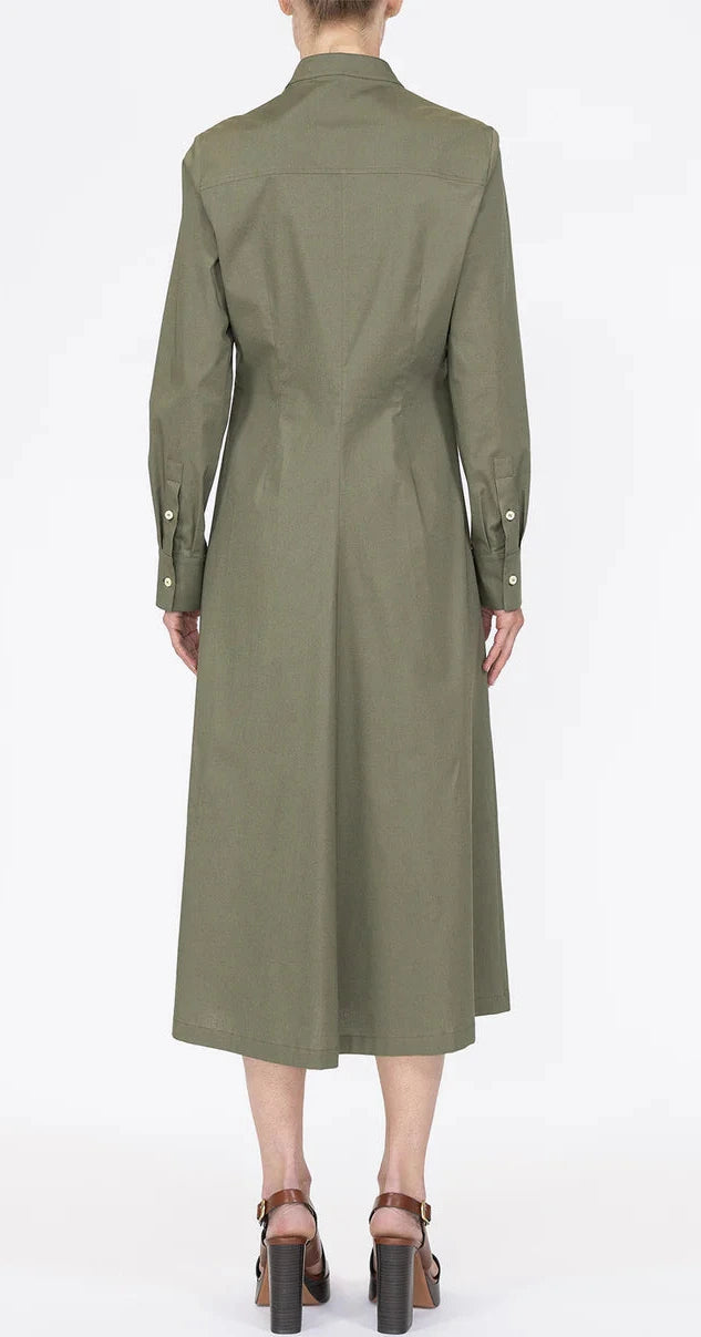 A person is shown from the back wearing the Callas Milano Genny Dress in olive green Italian shirting twill, styled with brown heeled sandals.
