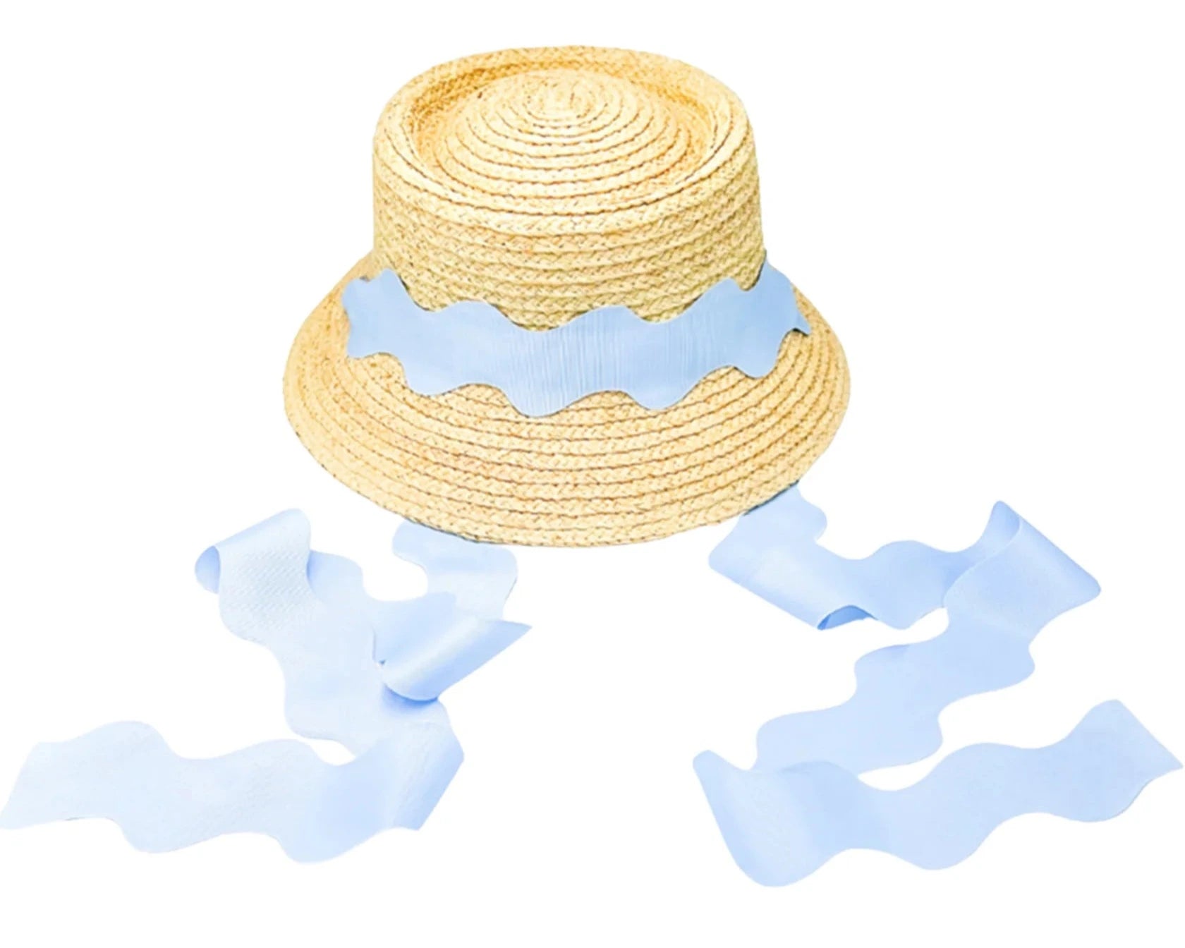 The Youth Harbor Hat by Bits & Bows is a woven straw beach hat with a wide, wavy light blue ribbon band and trailing ribbons, shown on a white background—ideal for stylish sun protection.