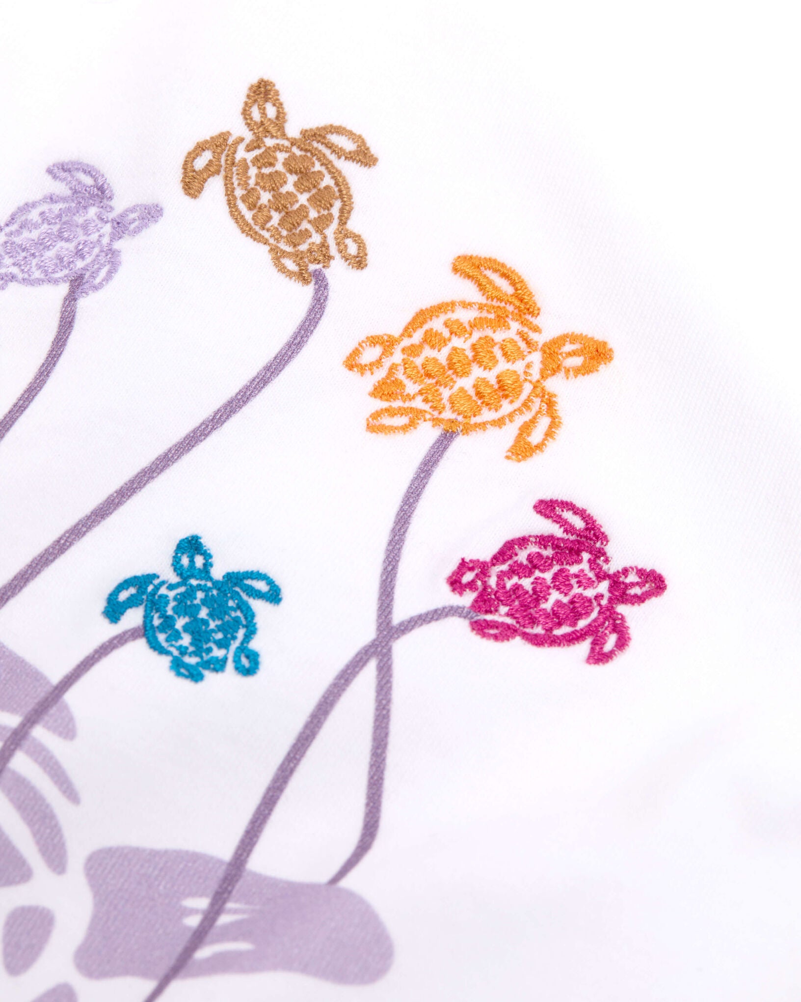 Five colorful turtles illustrated as flowers with long stems adorn the Vilebrequin Girls' Mini Turtle Tee, capturing the brand's playful style—perfect for a fun, everyday look.