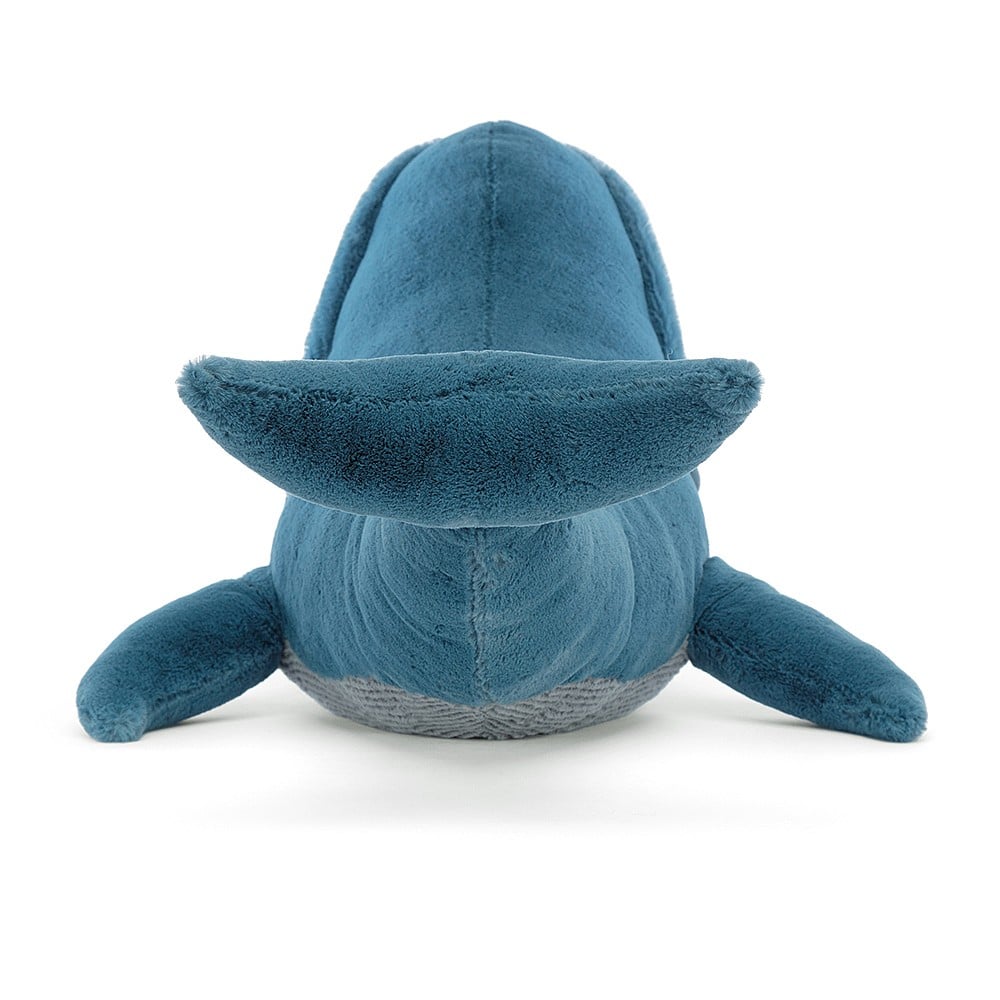 Gilbert the Great Blue Whale, a stuffed animal whale, available for online purchase from Jellycat. The adorable plush is showcased against a clean white background.