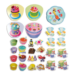 Bright cardboard cutouts of cupcakes, baking utensils, measuring cups, bowls, food ingredients, and baked treats are neatly arranged in rows on a white background—perfect for imaginative play or enhancing family fun with the Eeboo Cupcake Shaped Spinner Game.