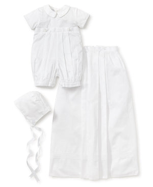 A white christening gown with a hat and bonnet, made from Kissy Kissy.