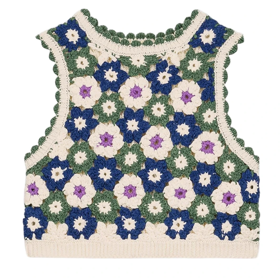 The Girls' Rynia Crochet Top by Louise Misha is a hand-crocheted sleeveless crop top with a vibrant floral granny square pattern in green, cream, white, blue, and purple.