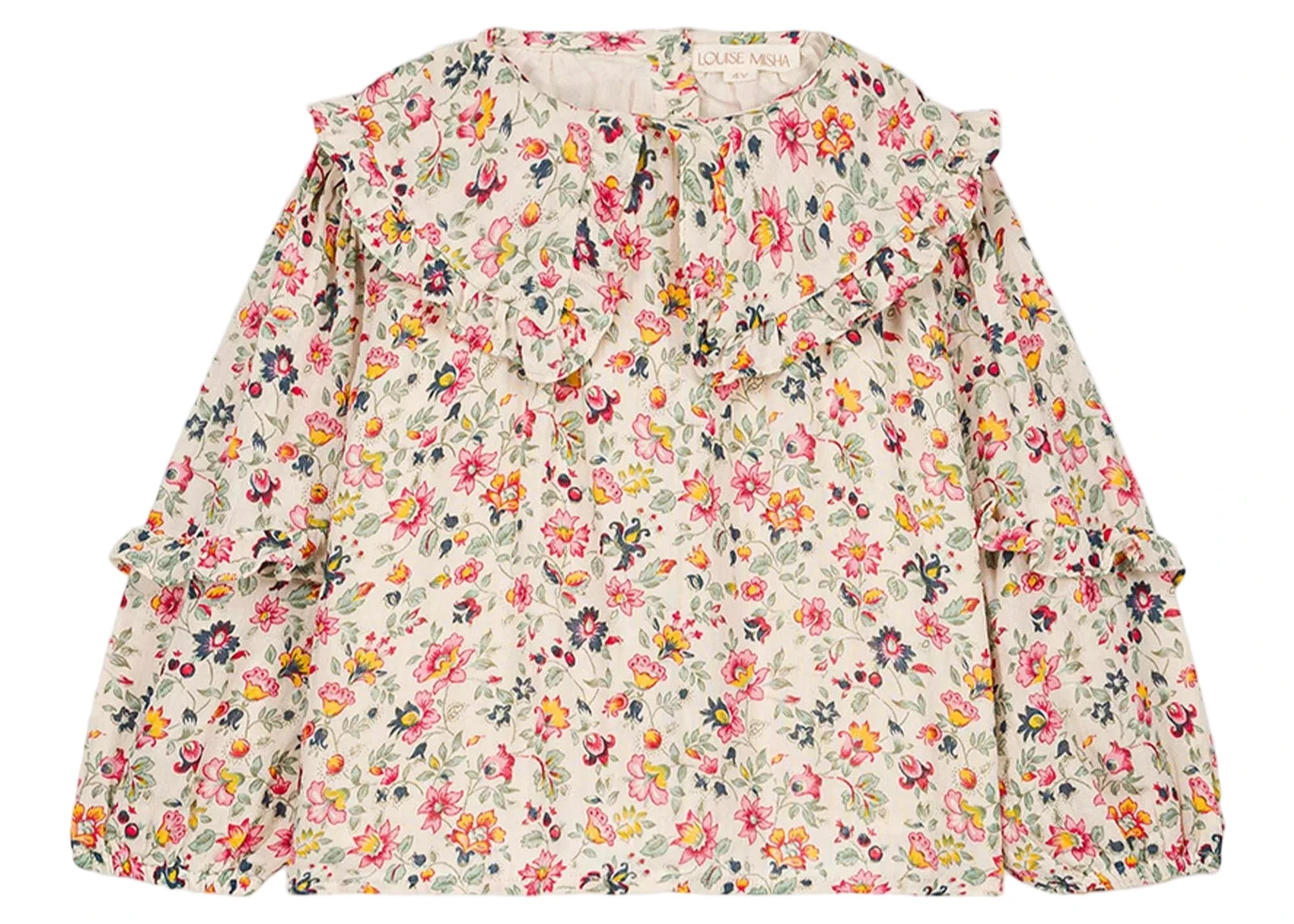 The Louise Misha Girls' Cleo Blouse is a long-sleeve cotton gauze top with ruffled collar and cuffs, decorated with a vibrant floral print on a light background.