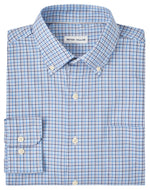 A folded Peter Millar Albert Crown Lite Cotton-Stretch Sport Shirt in blue and white checkered pattern with a "Peter Millar" label on the collar, featuring easy-care performance yarns.